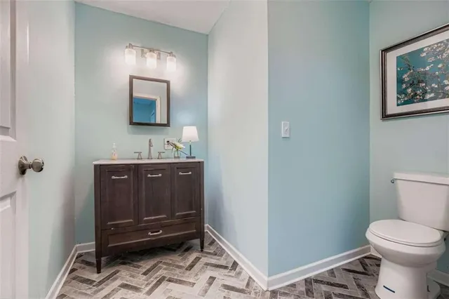 a bathroom with a shower and a sink