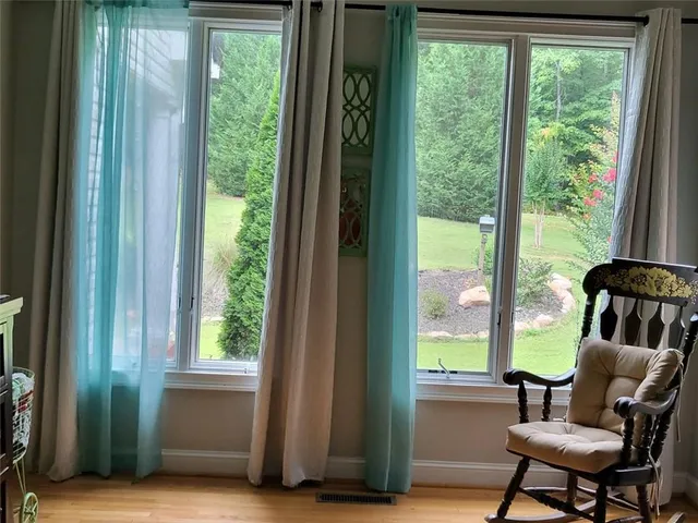 a small garden covered with tall trees