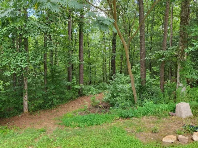 a view of an empty room with empty shelves