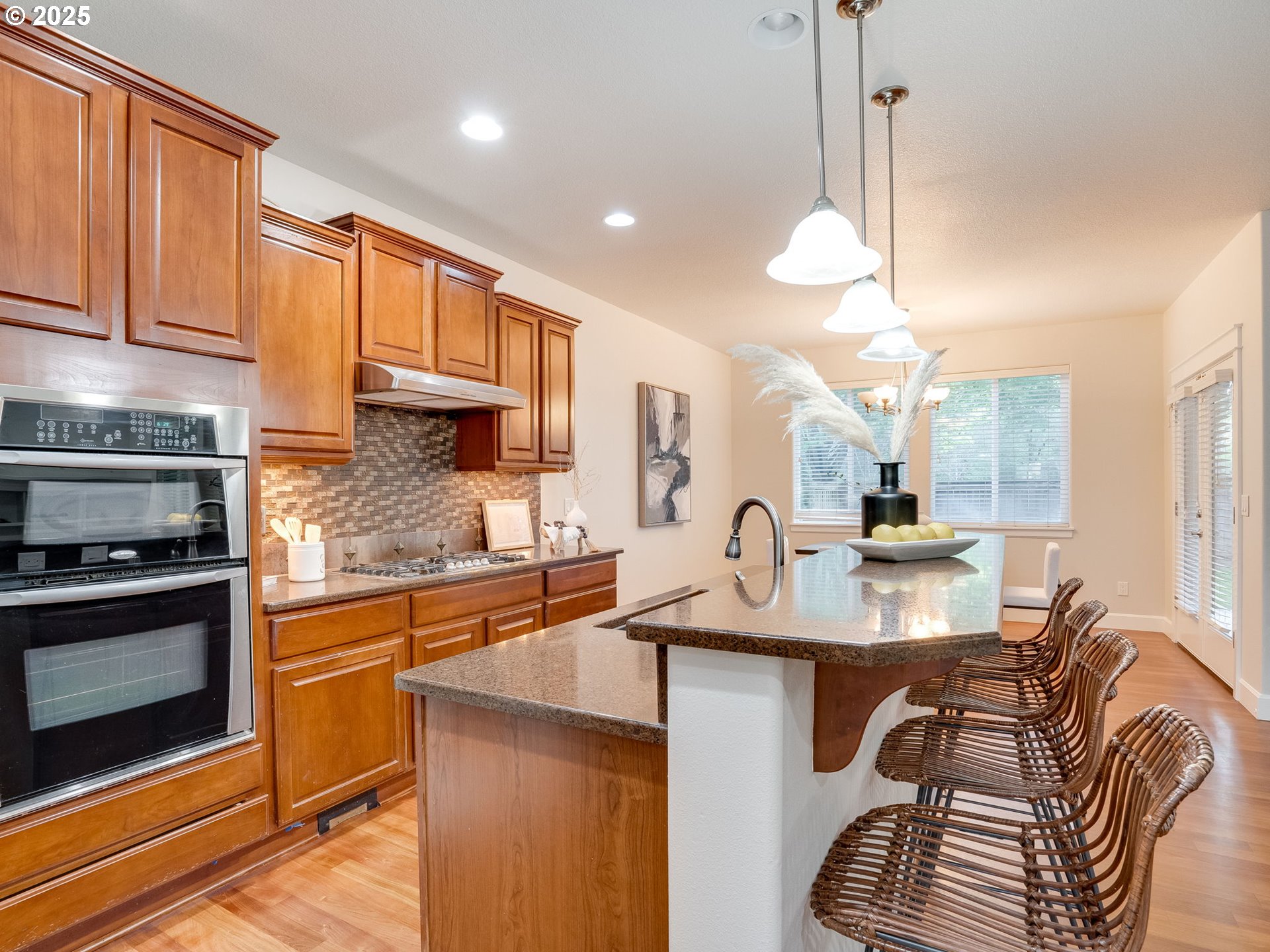 1308 Southeast 193rd Place Camas, WA 98607 - Photo 15 of 33 a kitchen with sink stove and cabinets