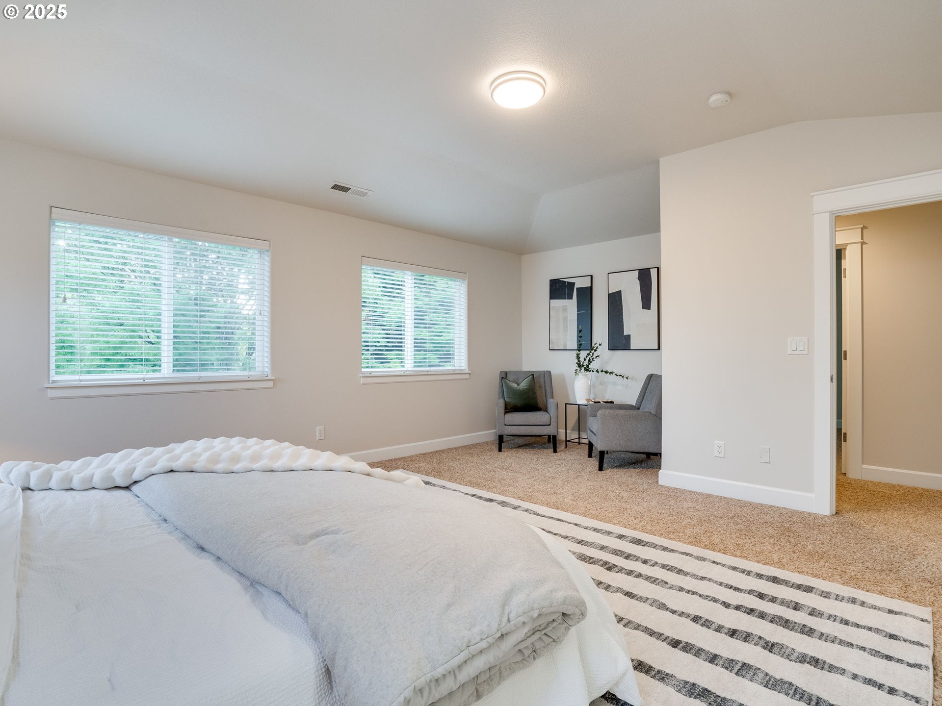 1308 Southeast 193rd Place Camas, WA 98607 - Photo 23 of 33 a spacious bedroom with a bed and window