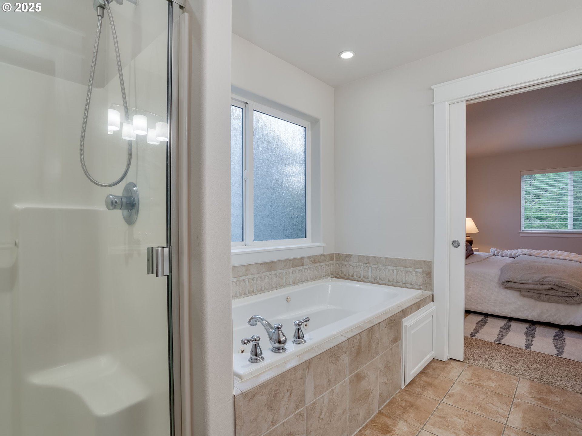 1308 Southeast 193rd Place Camas, WA 98607 - Photo 24 of 33 a bathroom with a tub and a shower