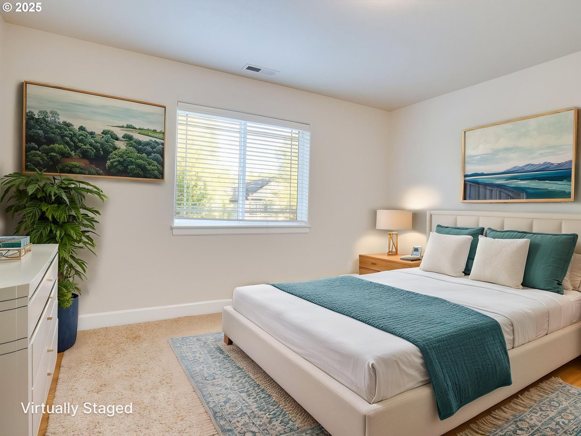 1308 Southeast 193rd Place Camas, WA 98607 - Photo 30 of 33 a bedroom with bed and a painting on the wall