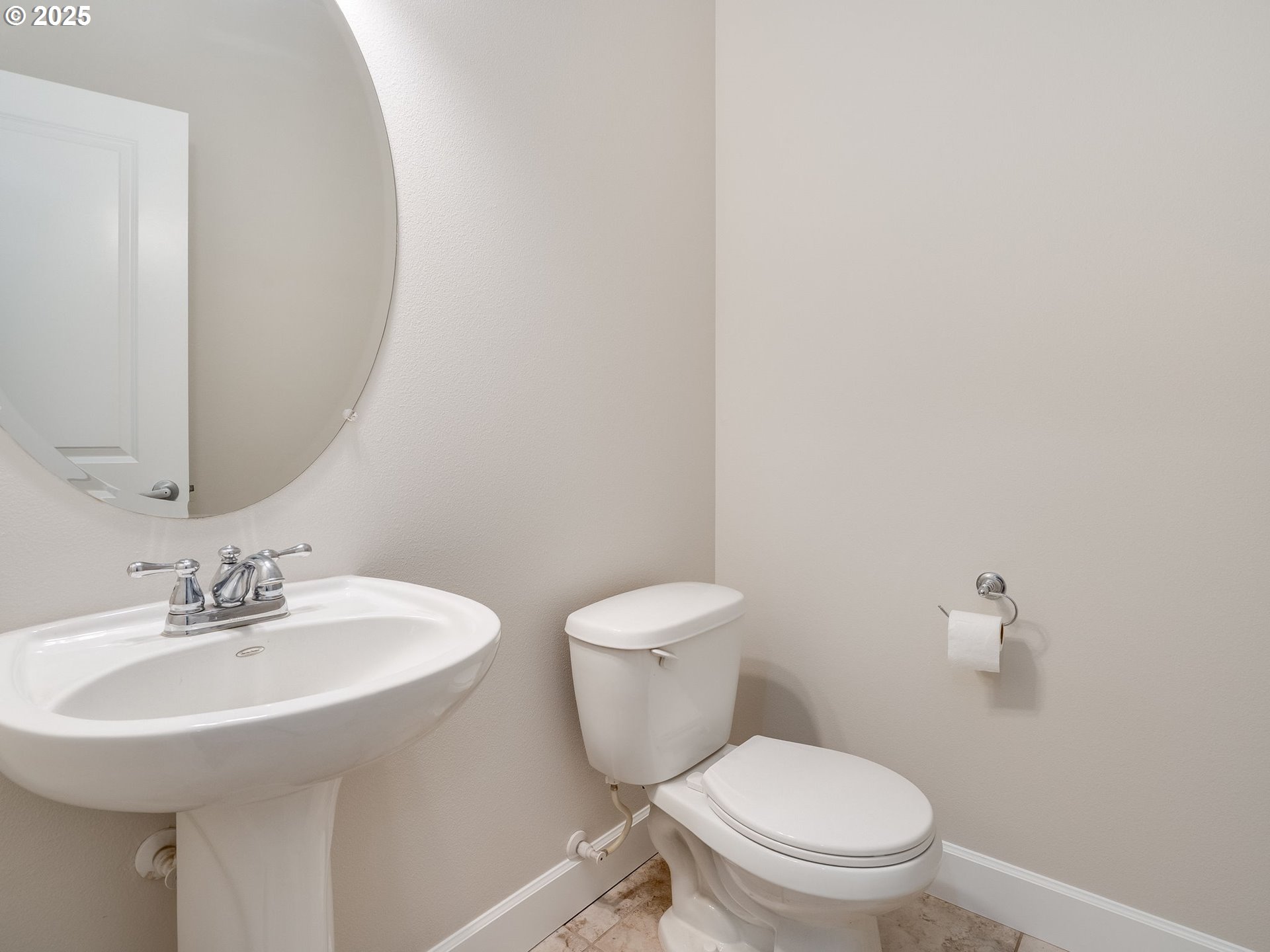 1308 Southeast 193rd Place Camas, WA 98607 - Photo 6 of 33 a bathroom with a sink a toilet and mirror