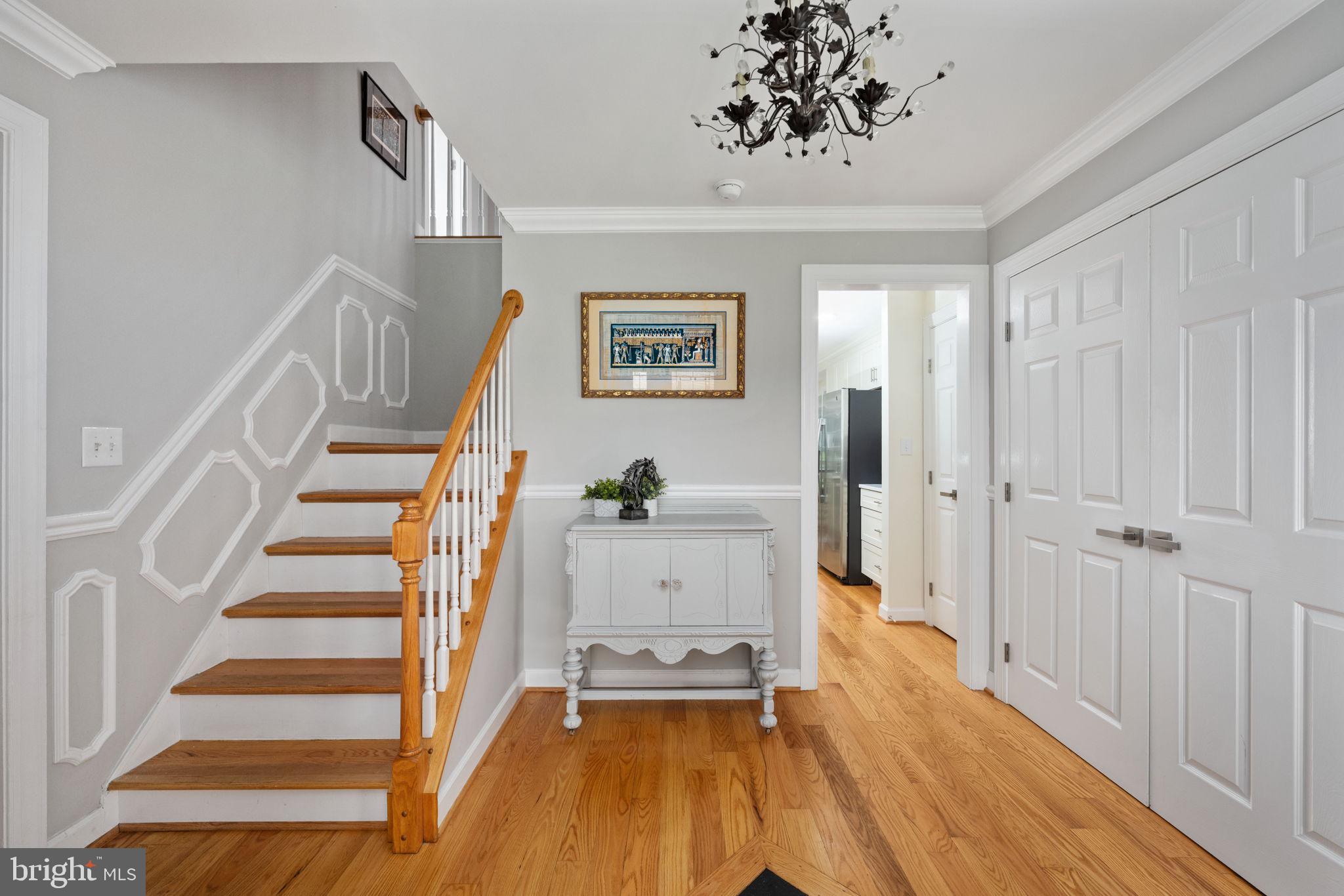 5191 Beach Ridge Lane Amissville, VA 20106 - Photo 15 of 91 a view of a hallway with wooden floor and staircase