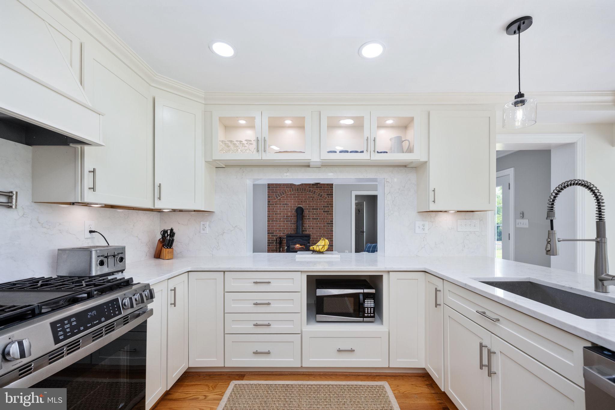 5191 Beach Ridge Lane Amissville, VA 20106 - Photo 18 of 91 a kitchen with stainless steel appliances granite countertop a stove and a sink