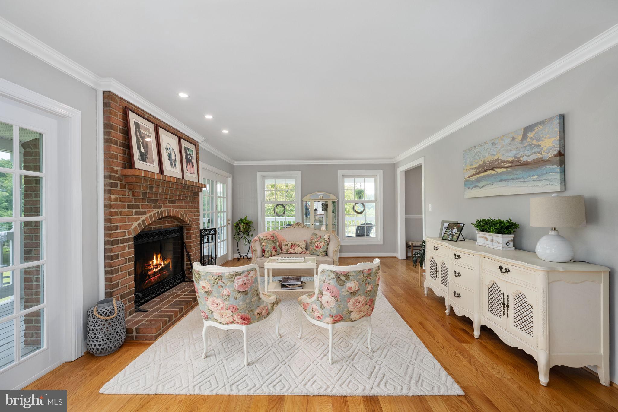 5191 Beach Ridge Lane Amissville, VA 20106 - Photo 22 of 91 a living room with furniture and a fireplace