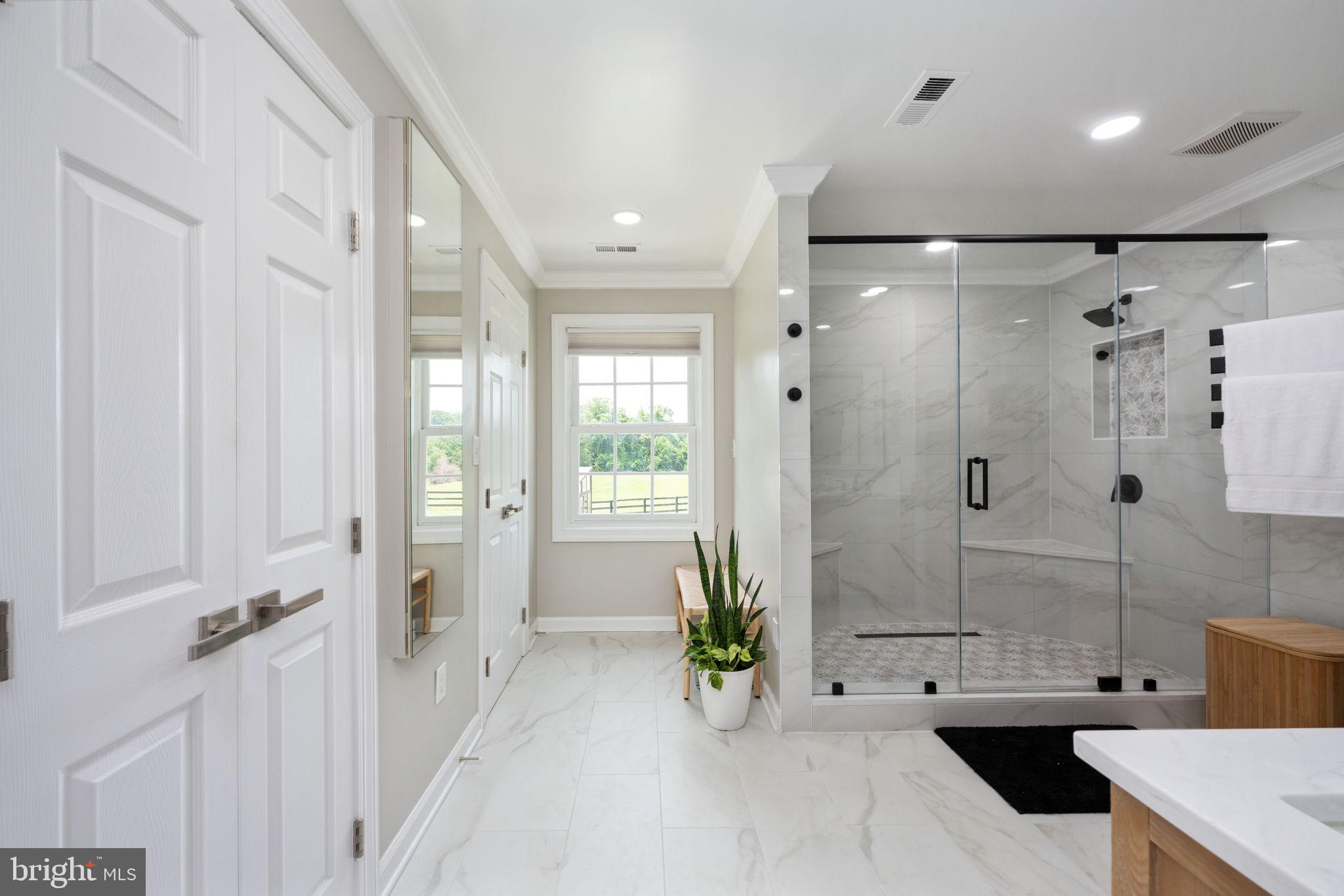 5191 Beach Ridge Lane Amissville, VA 20106 - Photo 28 of 91 a bathroom with a tub shower and sink