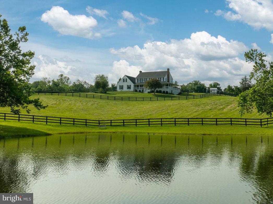 5191 Beach Ridge Lane Amissville, VA 20106 - Photo 4 of 91 a view of a lake with a big yard