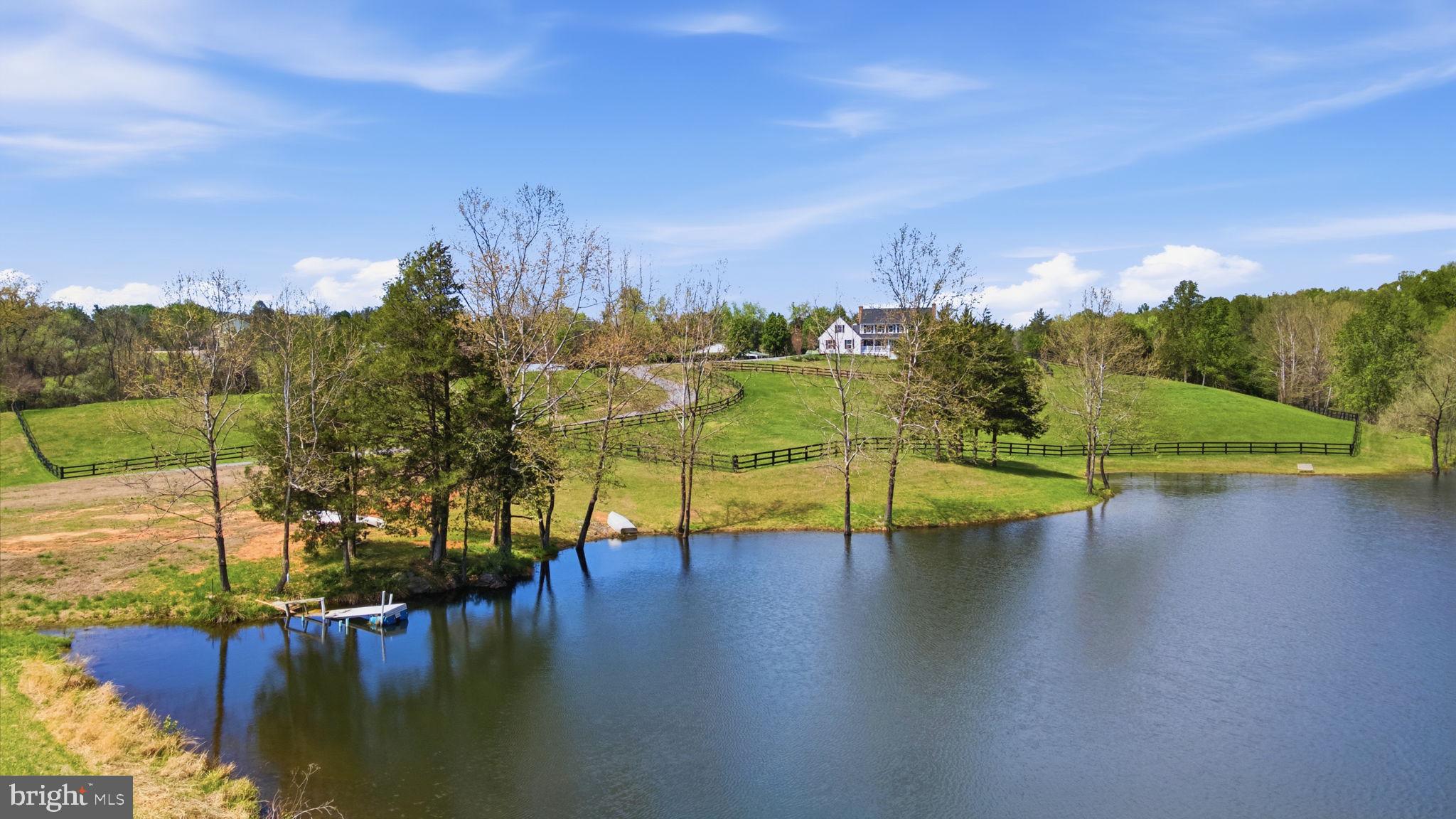 5191 Beach Ridge Lane Amissville, VA 20106 - Photo 76 of 91 a view of a lake with houses