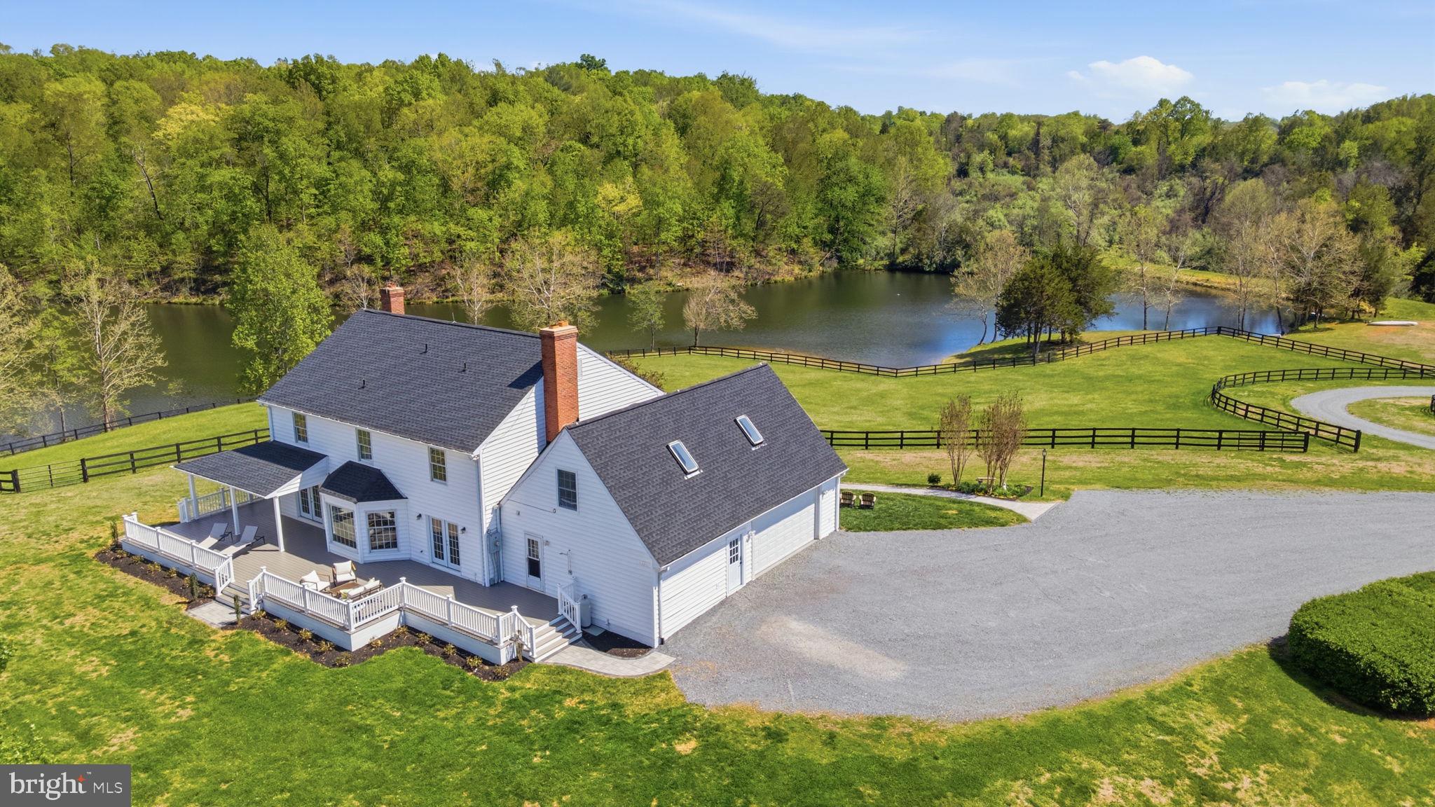5191 Beach Ridge Lane Amissville, VA 20106 - Photo 87 of 91 an aerial view of a house with garden space and a patio