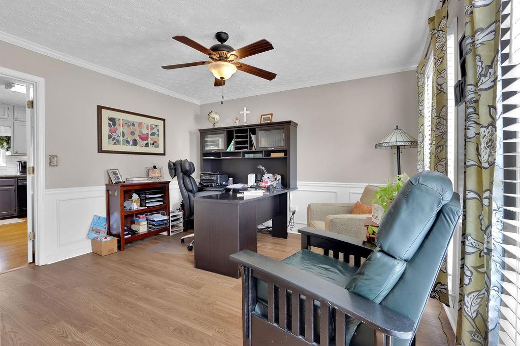 2385 Waterton Ridge Trail Grayson, GA 30017 - Photo 7 of 38 a living room with furniture and a flat screen tv