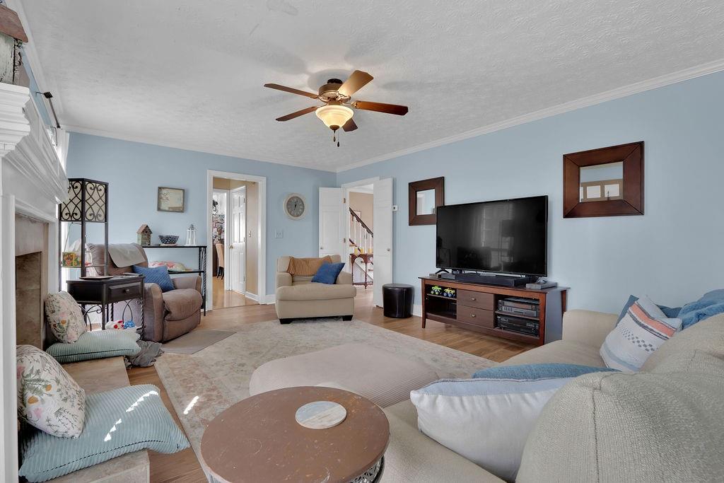 2385 Waterton Ridge Trail Grayson, GA 30017 - Photo 10 of 38 a living room with furniture and a flat screen tv