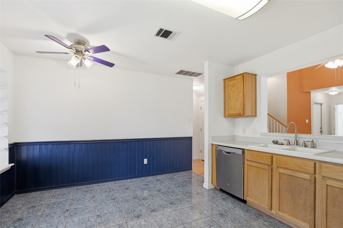 3215 Port Anne Way Leander, TX 78641 - Photo 14 of 30 a view of a bathroom with a sink and a mirror