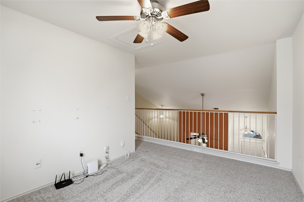 3215 Port Anne Way Leander, TX 78641 - Photo 24 of 30 an empty room with ceiling fan and windows