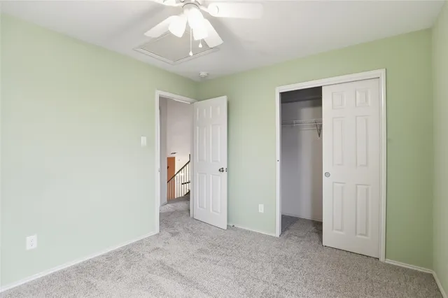 a view of a chandelier in big room and chandelier