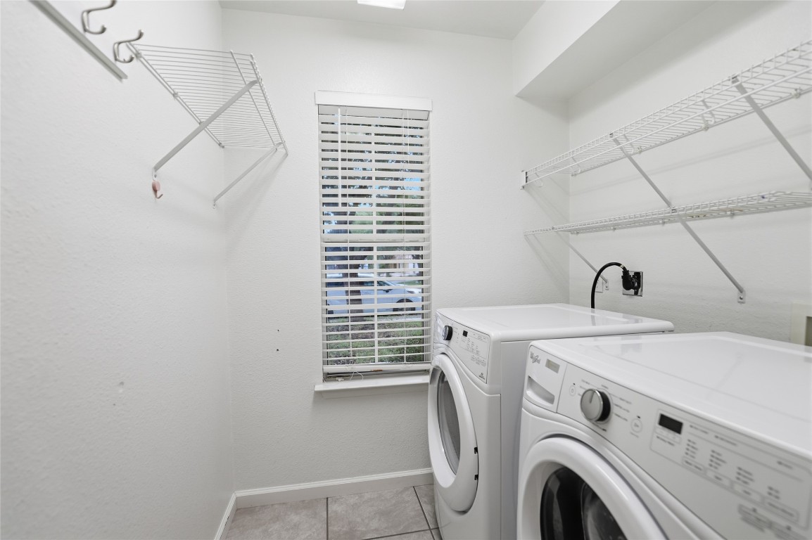 3215 Port Anne Way Leander, TX 78641 - Photo 6 of 30 a utility room with dryer and washer
