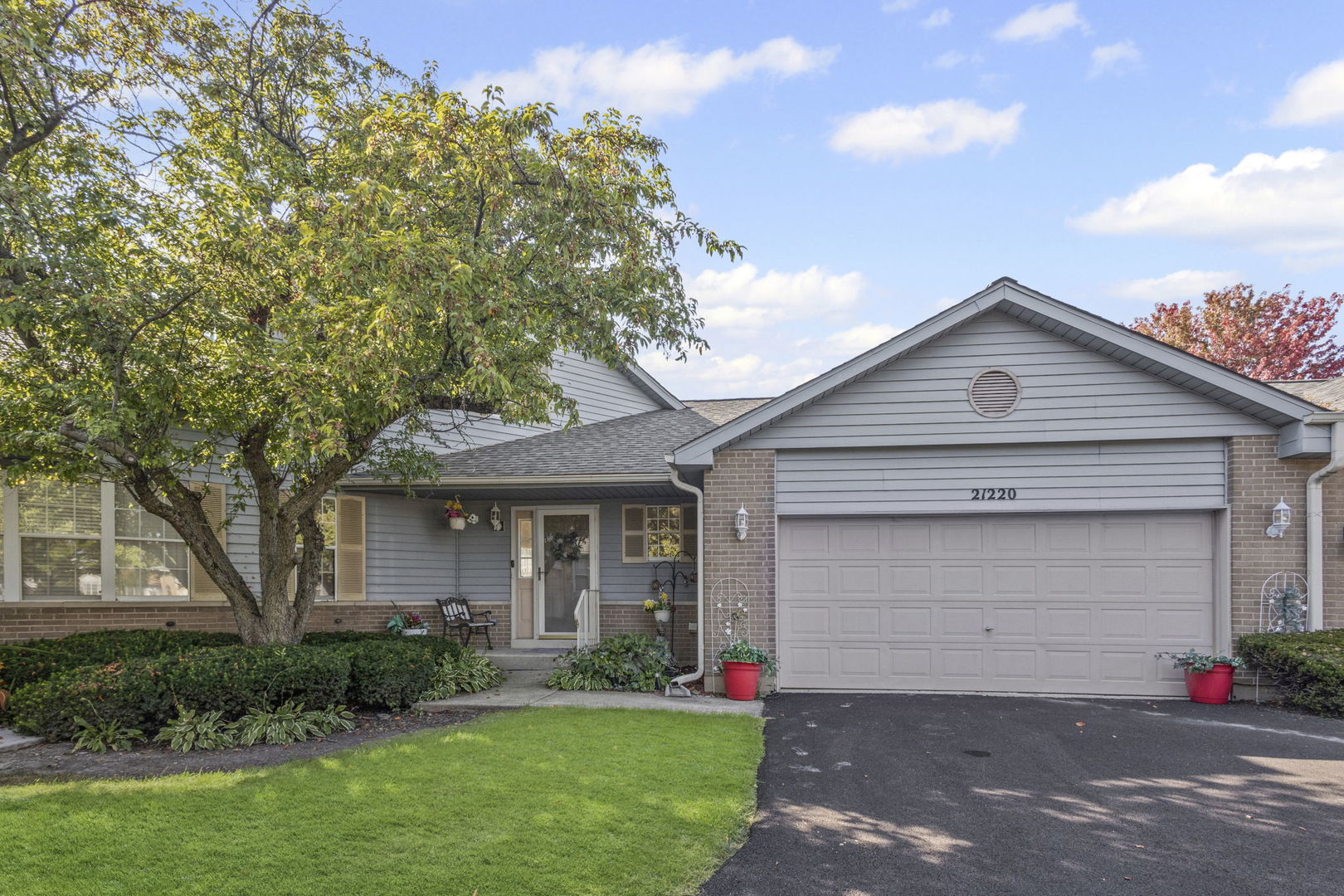 21220 Silktree Circle Plainfield, IL 60544 - Photo 1 of 29 a front view of a house with a yard and garage