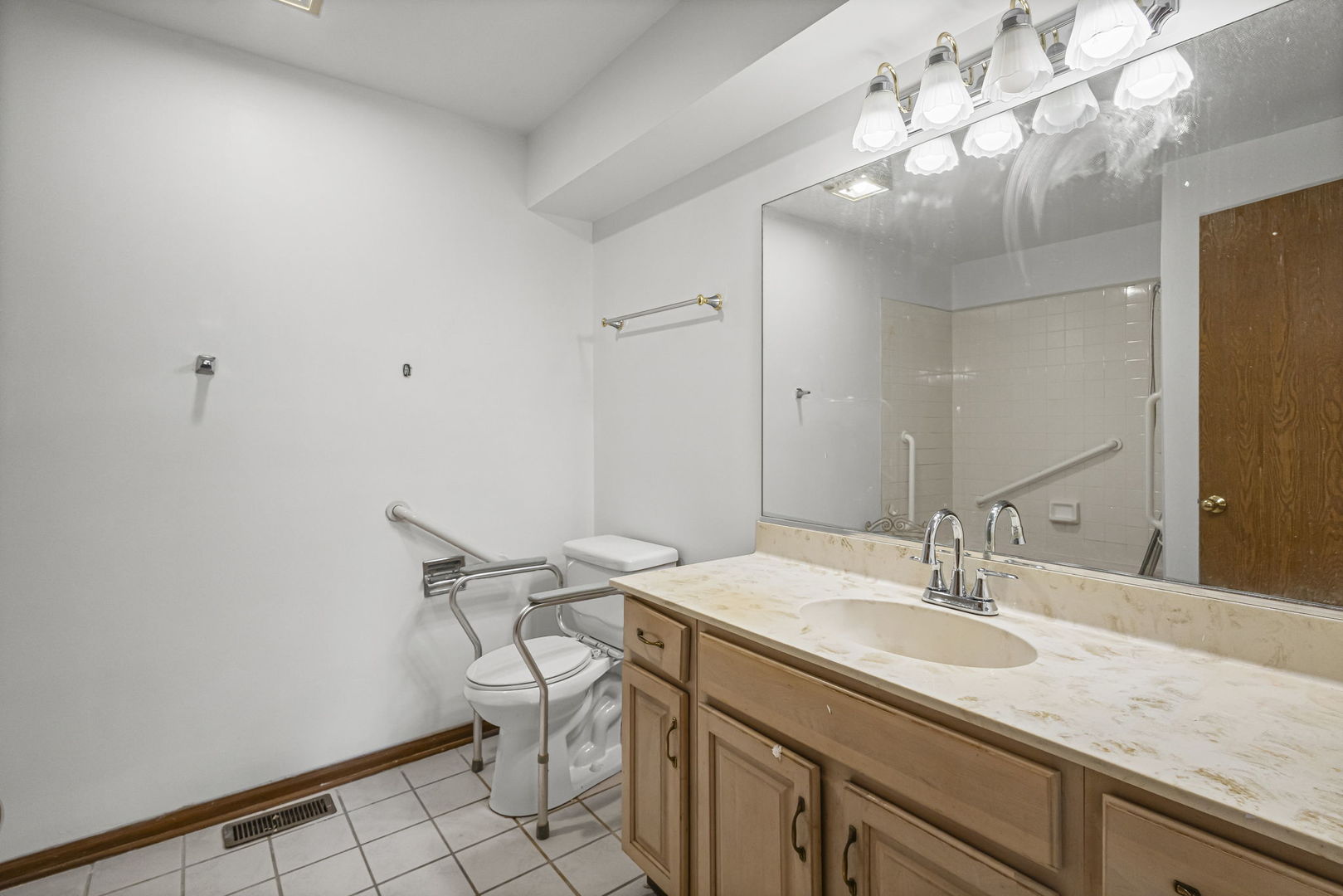 21220 Silktree Circle Plainfield, IL 60544 - Photo 11 of 29 a bathroom with a sink vanity and a mirror