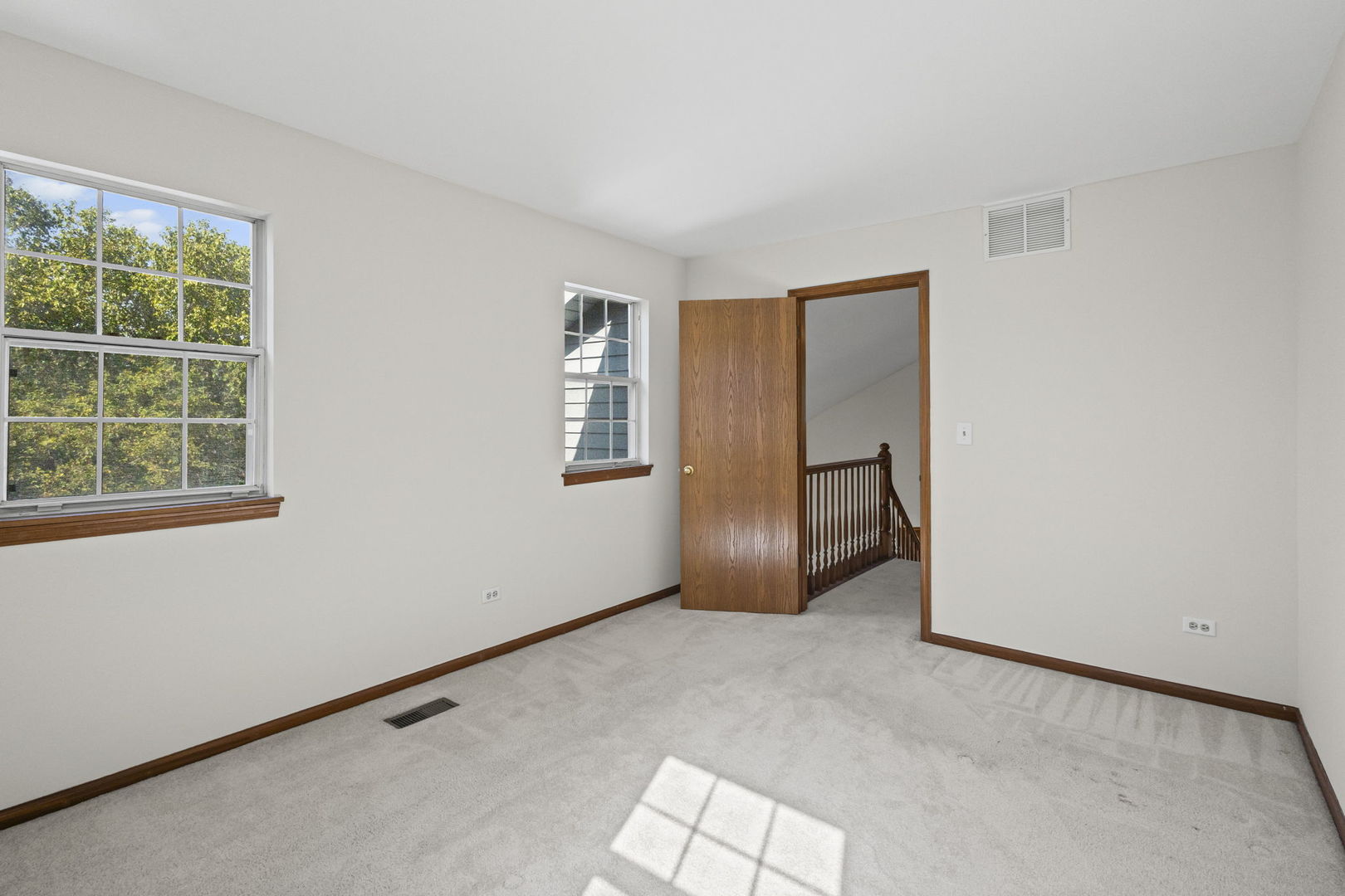21220 Silktree Circle Plainfield, IL 60544 - Photo 13 of 29 an empty room with windows