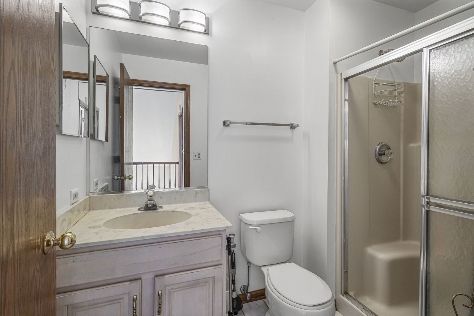 21220 Silktree Circle Plainfield, IL 60544 - Photo 15 of 29 a bathroom with a sink toilet and shower