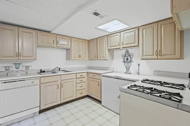 a view of balcony with wooden floor and outdoor seating