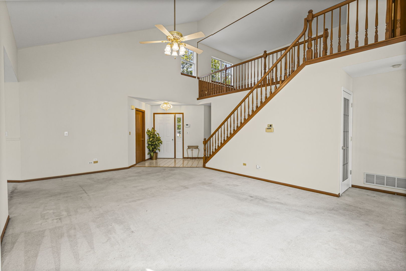 21220 Silktree Circle Plainfield, IL 60544 - Photo 3 of 29 a view of an empty room with wooden floor