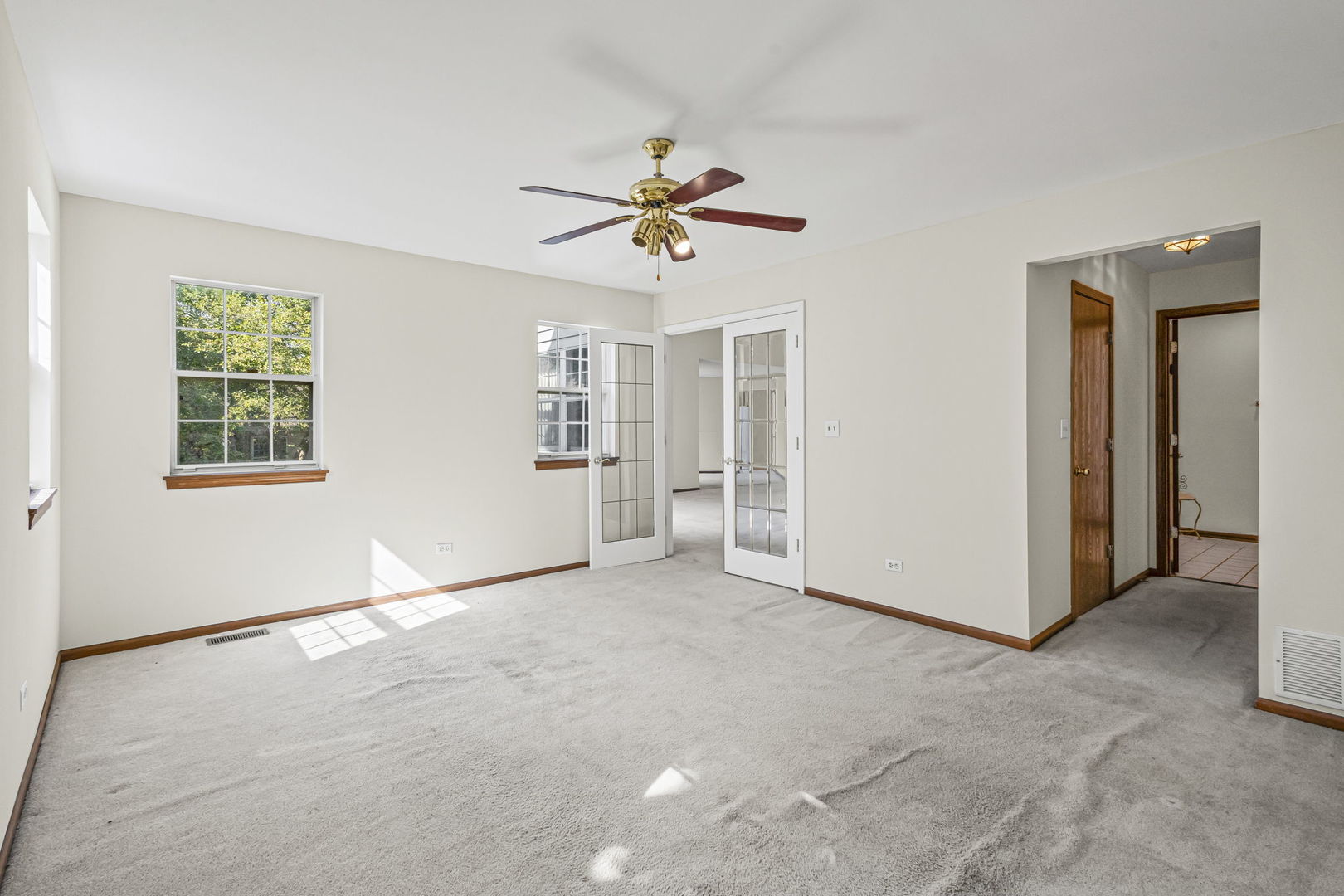 21220 Silktree Circle Plainfield, IL 60544 - Photo 10 of 29 wooden floor in an empty room with a window