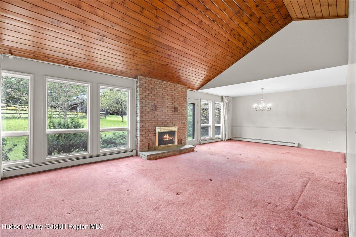 119 Mt Laurel Road Kerhonkson, NY 12446 - Photo 15 of 29 a view of empty room with windows