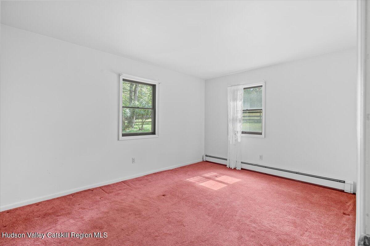 119 Mt Laurel Road Kerhonkson, NY 12446 - Photo 17 of 29 an empty room with windows