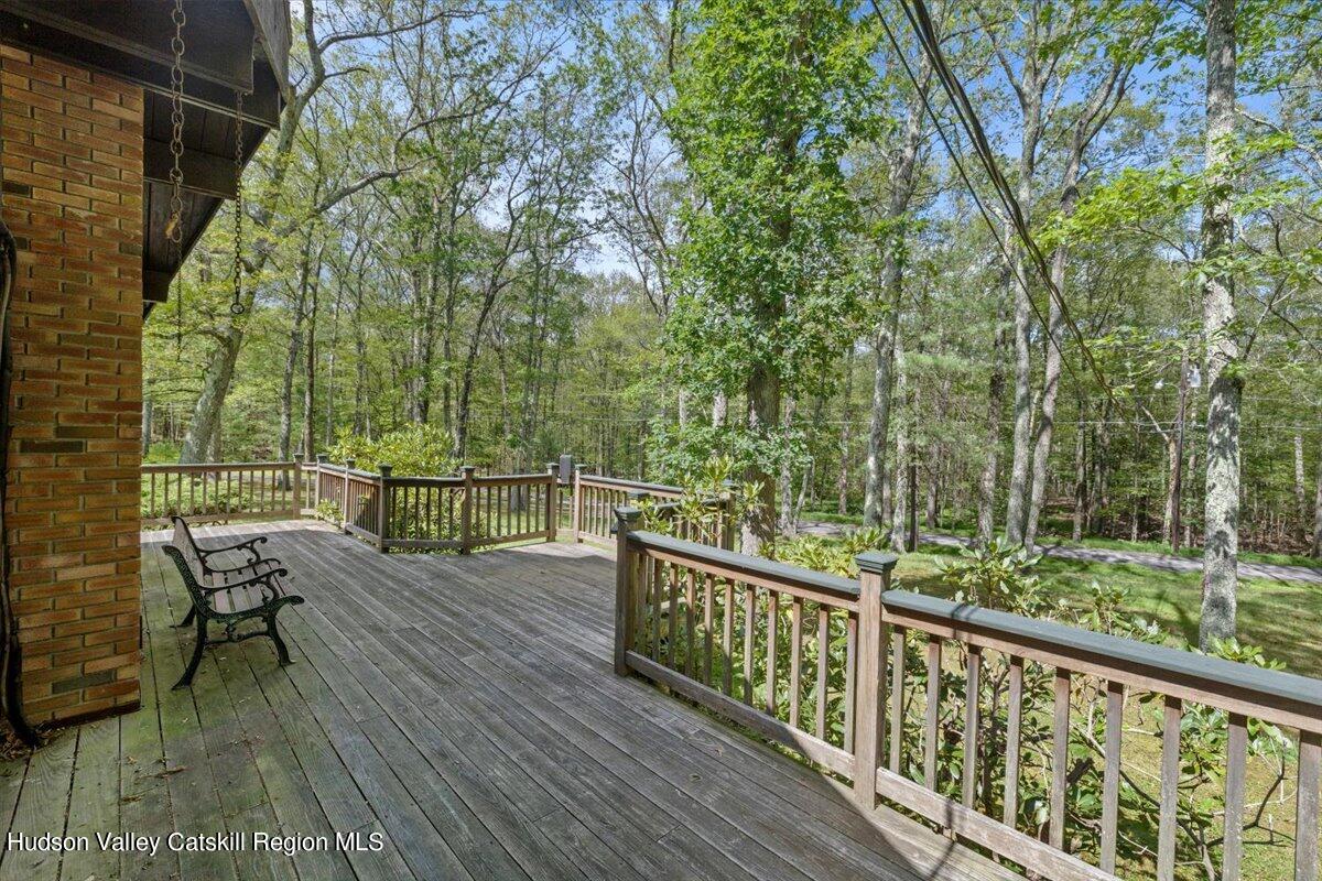 119 Mt Laurel Road Kerhonkson, NY 12446 - Photo 10 of 29 a view of balcony with furniture and wooden deck