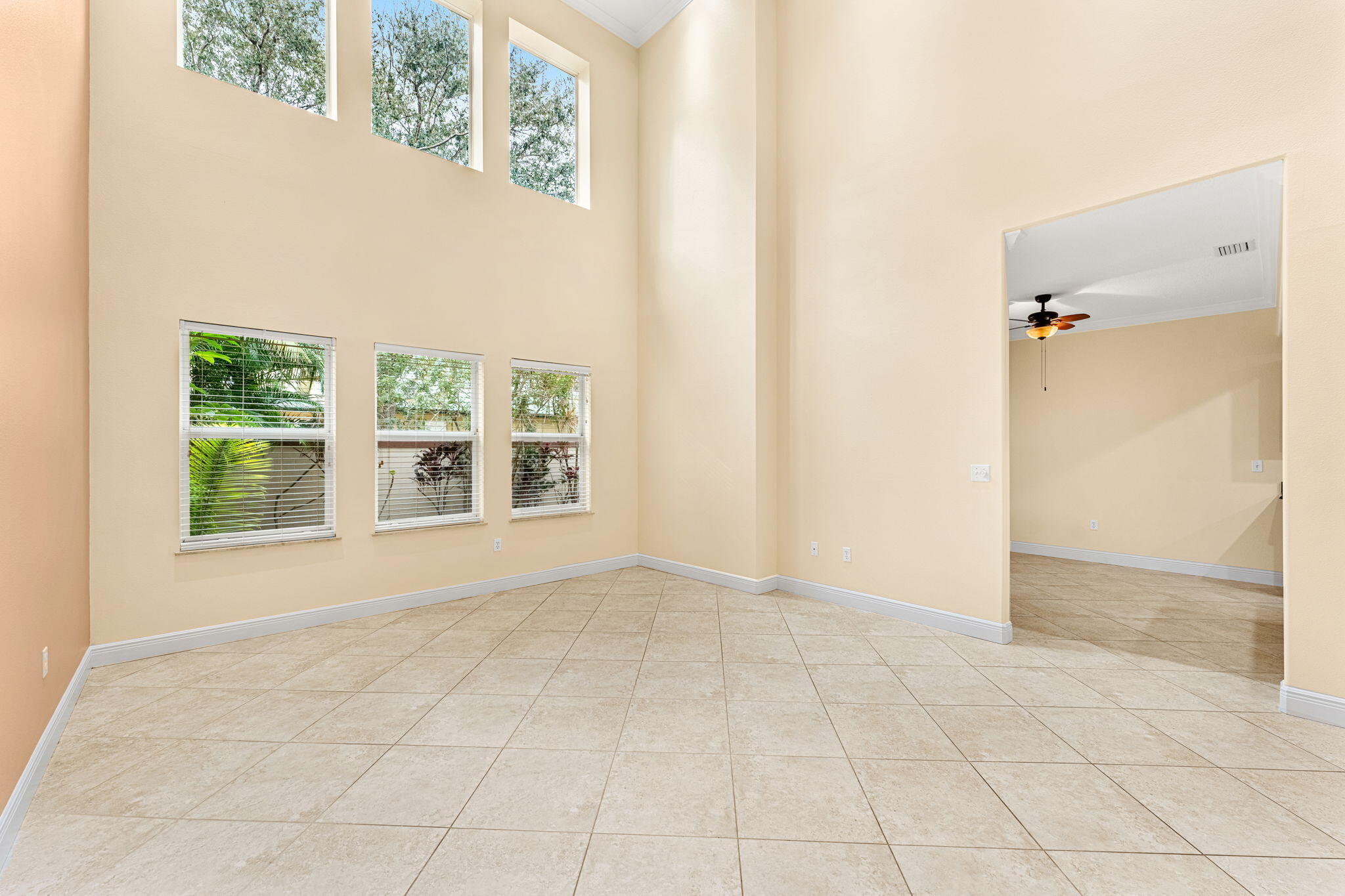 204 Holman Road, Unit 3 Cape Canaveral, FL 32920 - Photo 17 of 61 an empty room with a window