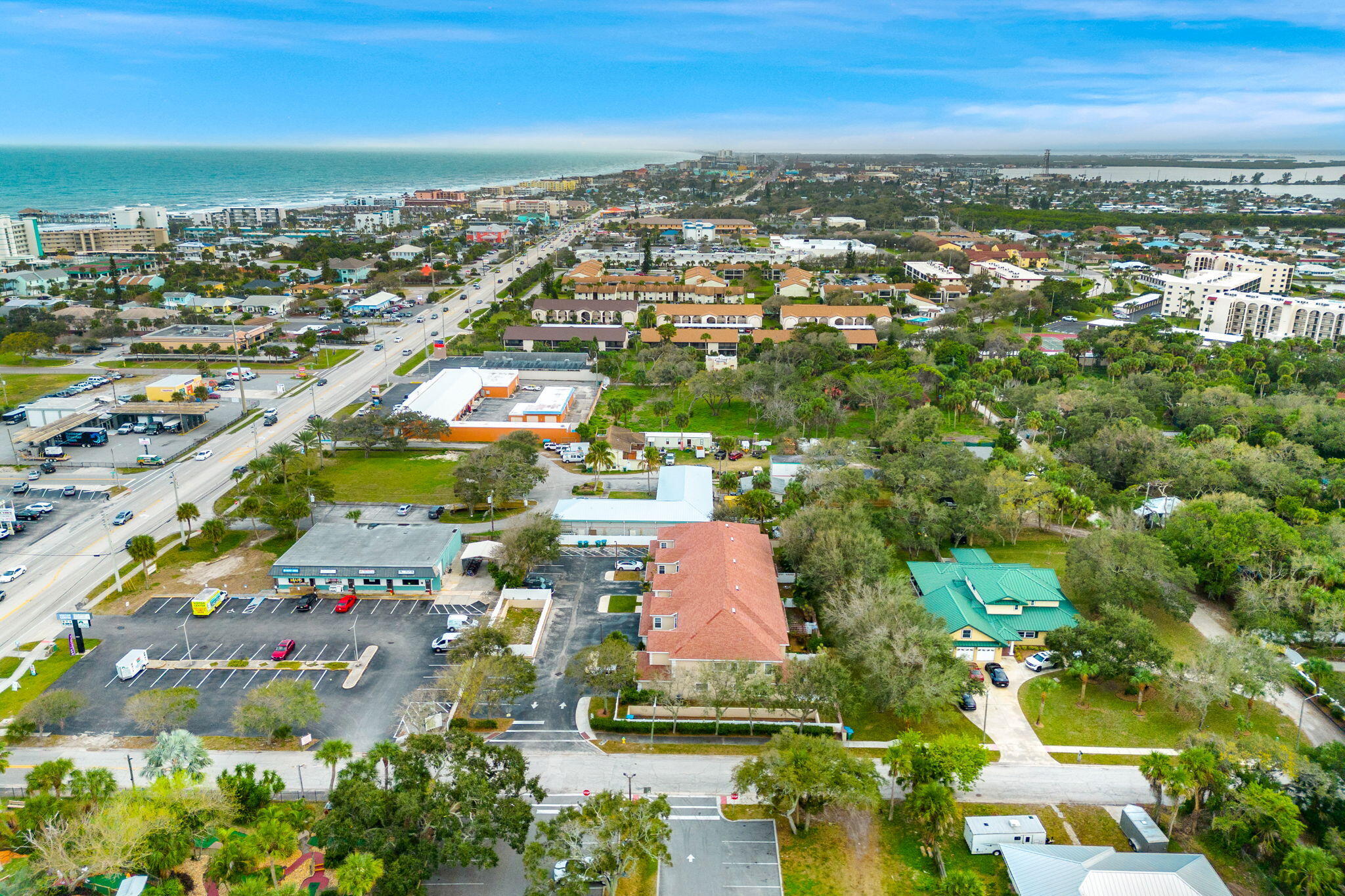 204 Holman Road, Unit 3 Cape Canaveral, FL 32920 - Photo 27 of 61 an aerial view of residential houses with outdoor space