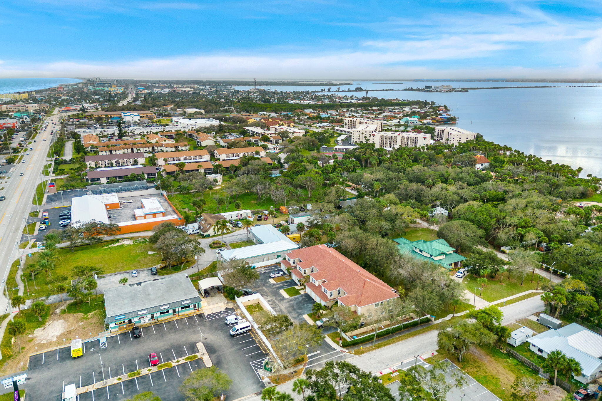 204 Holman Road, Unit 3 Cape Canaveral, FL 32920 - Photo 28 of 61 an aerial view of residential houses with outdoor space