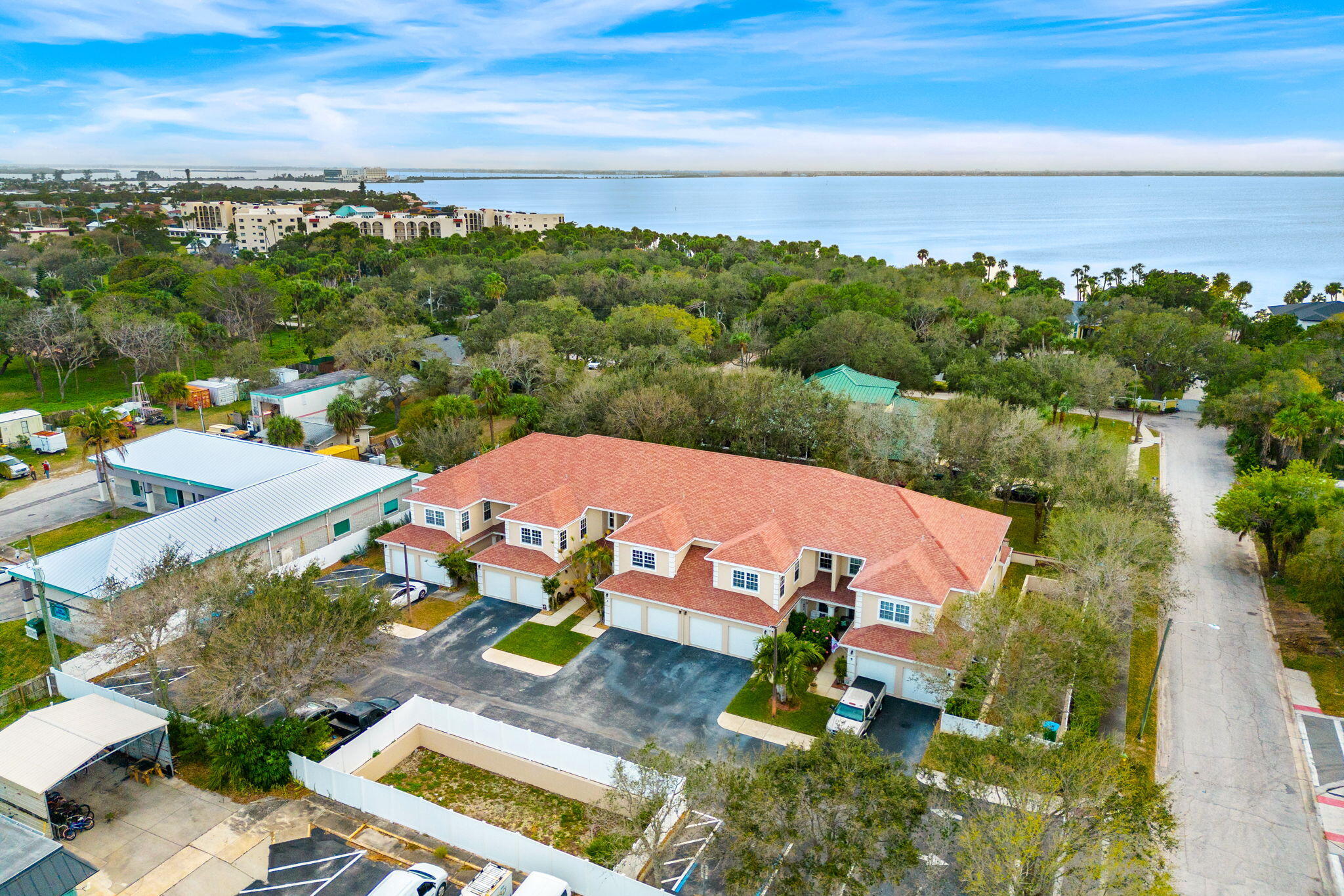 204 Holman Road, Unit 3 Cape Canaveral, FL 32920 - Photo 33 of 61 an aerial view of residential houses with outdoor space