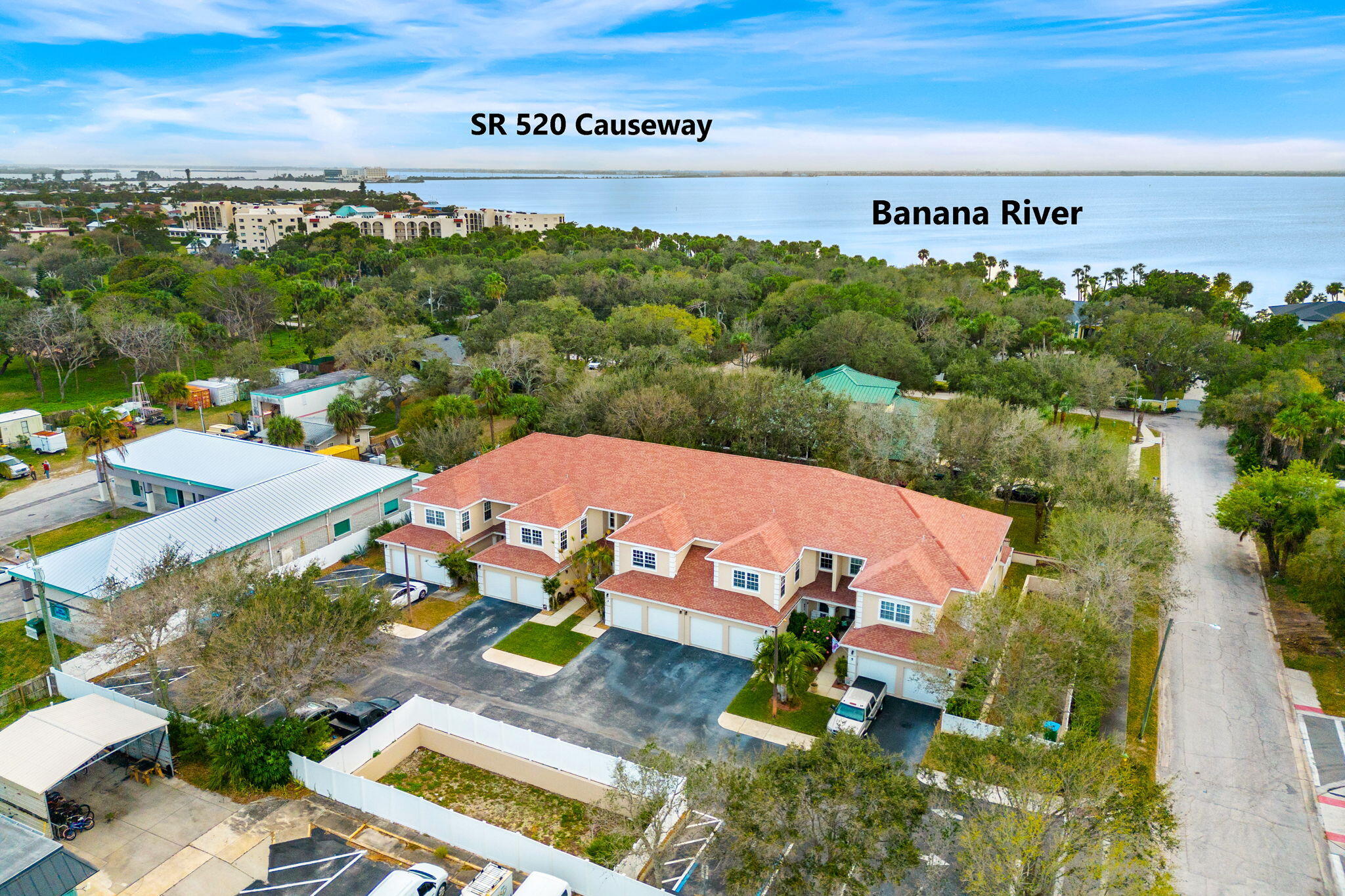 204 Holman Road, Unit 3 Cape Canaveral, FL 32920 - Photo 4 of 61 an aerial view of residential houses with outdoor space