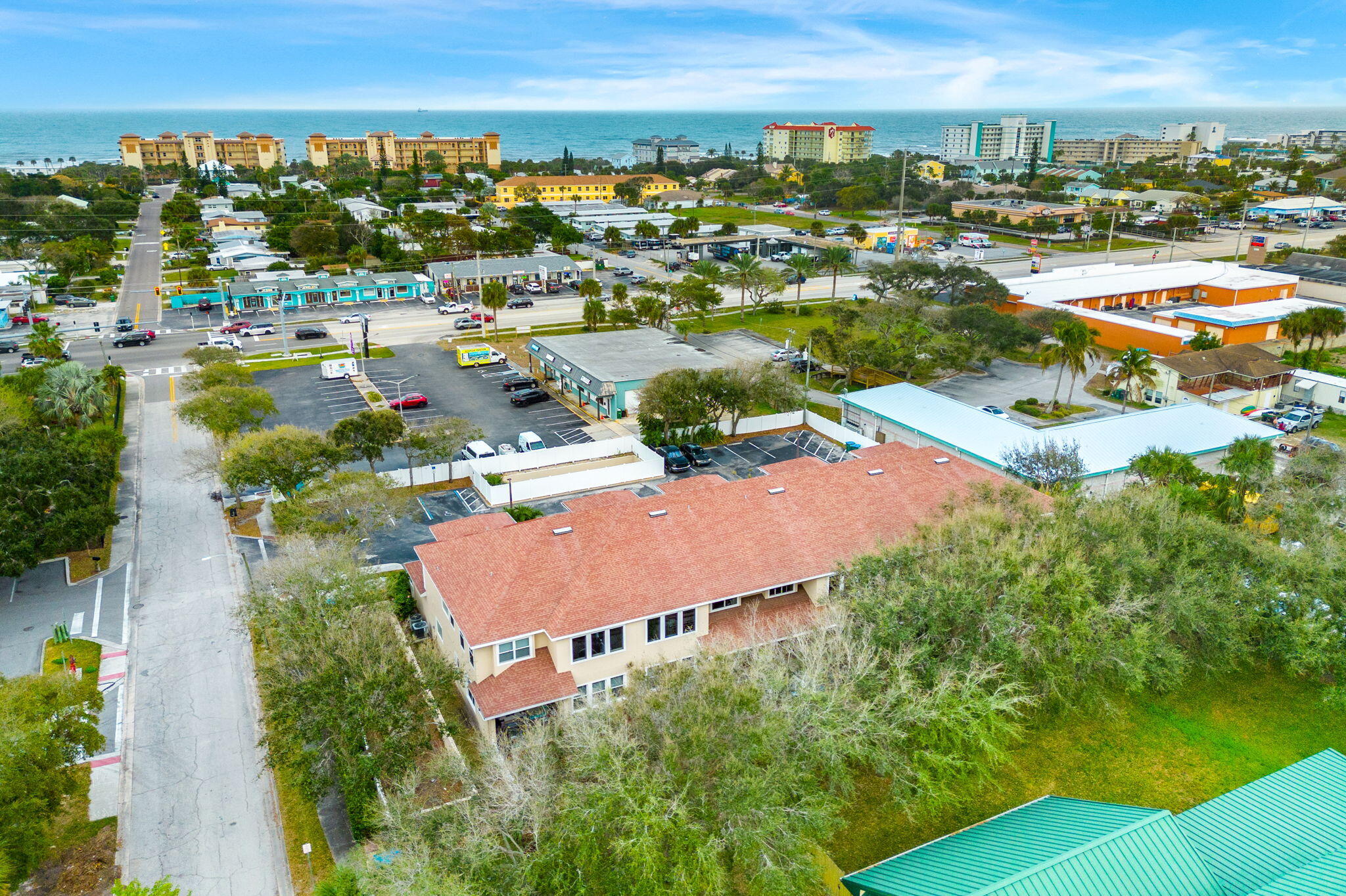 204 Holman Road, Unit 3 Cape Canaveral, FL 32920 - Photo 44 of 61 an aerial view of residential houses and outdoor space