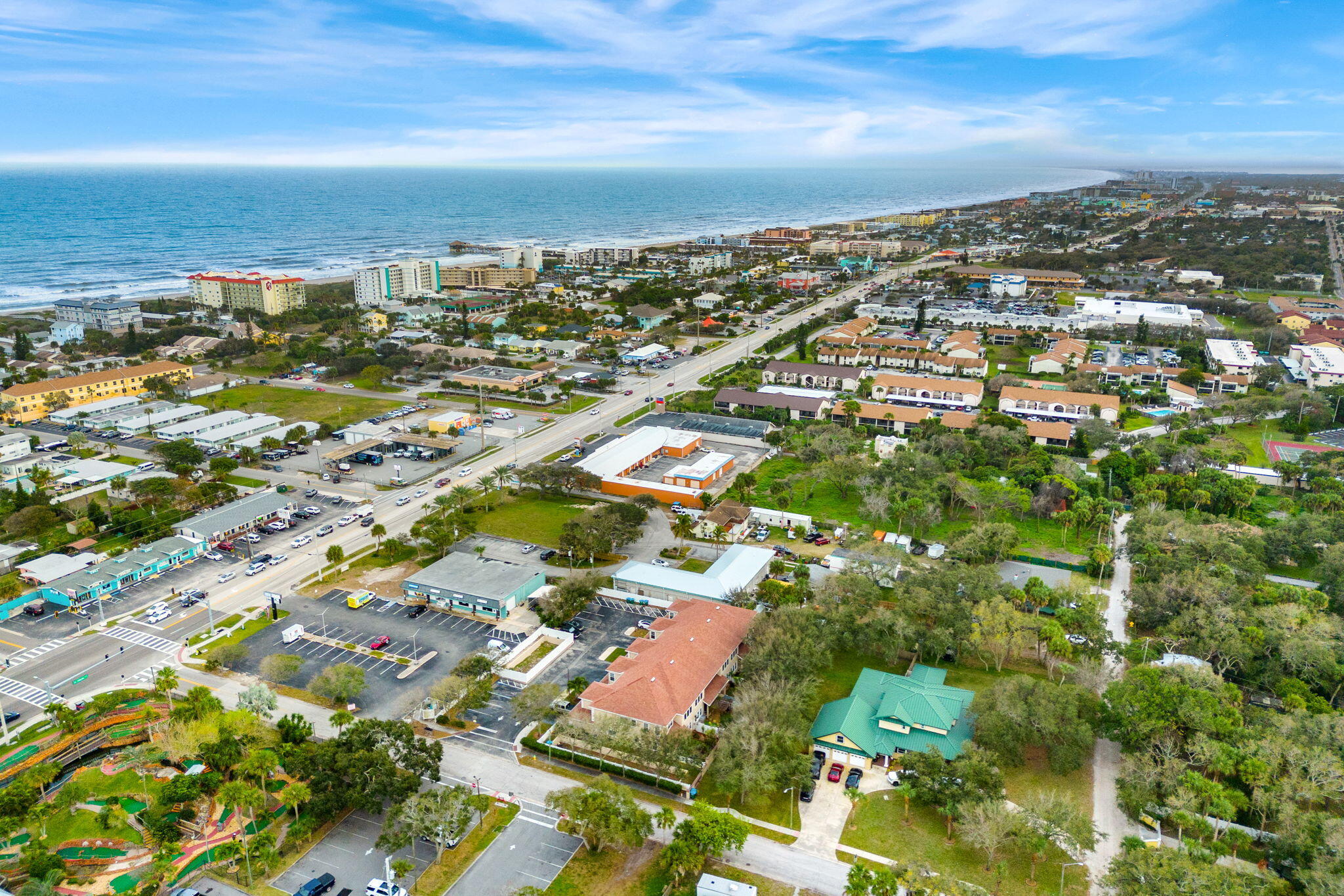 204 Holman Road, Unit 3 Cape Canaveral, FL 32920 - Photo 47 of 61 an aerial view of residential building with parking space