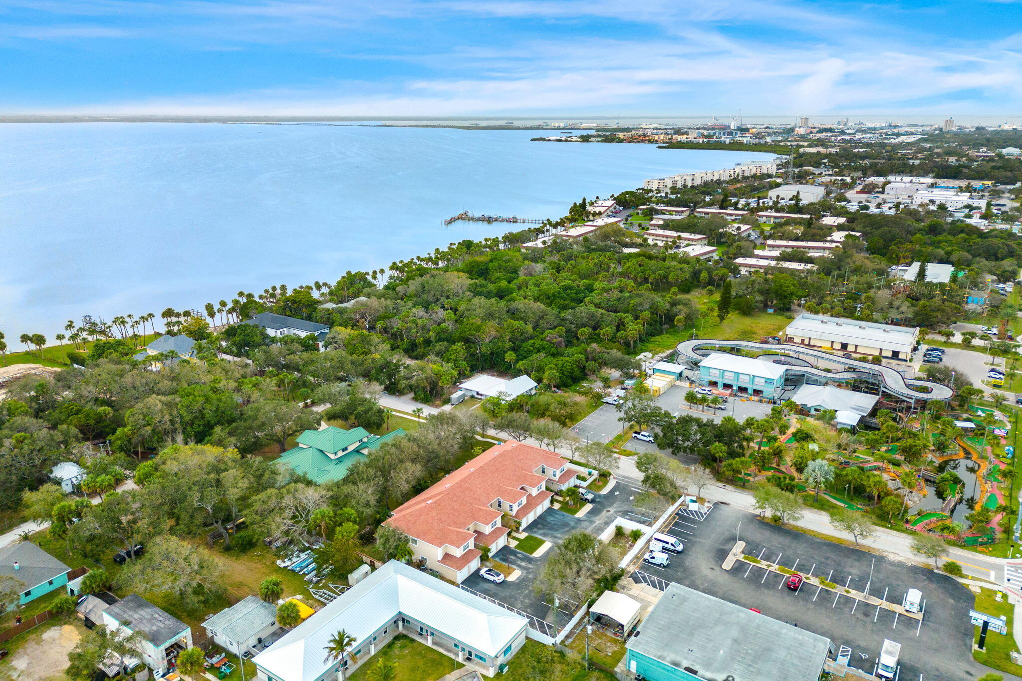204 Holman Road, Unit 3 Cape Canaveral, FL 32920 - Photo 51 of 61 an aerial view of a city with lots of residential buildings