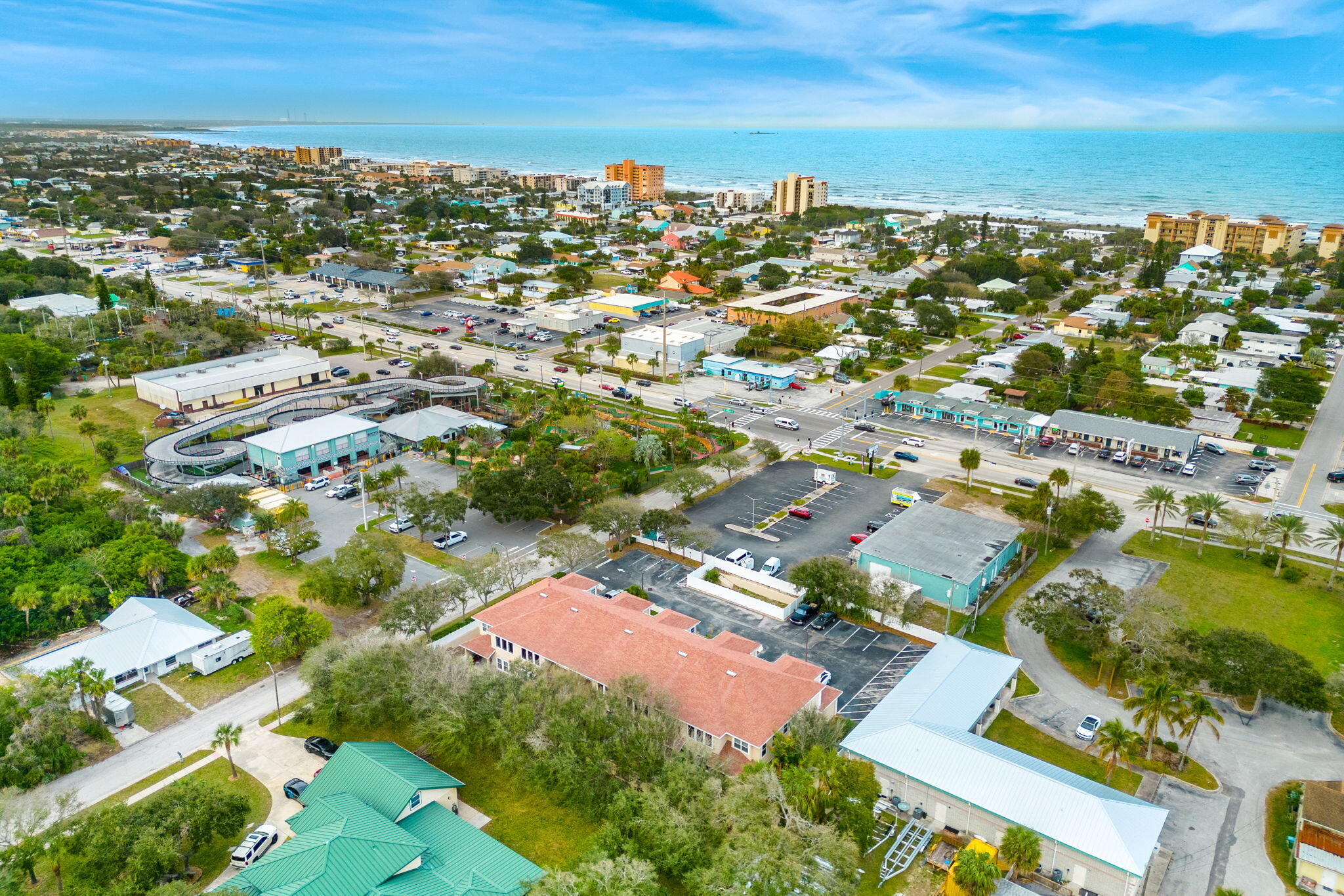 204 Holman Road, Unit 3 Cape Canaveral, FL 32920 - Photo 52 of 61 an aerial view of residential houses with outdoor space