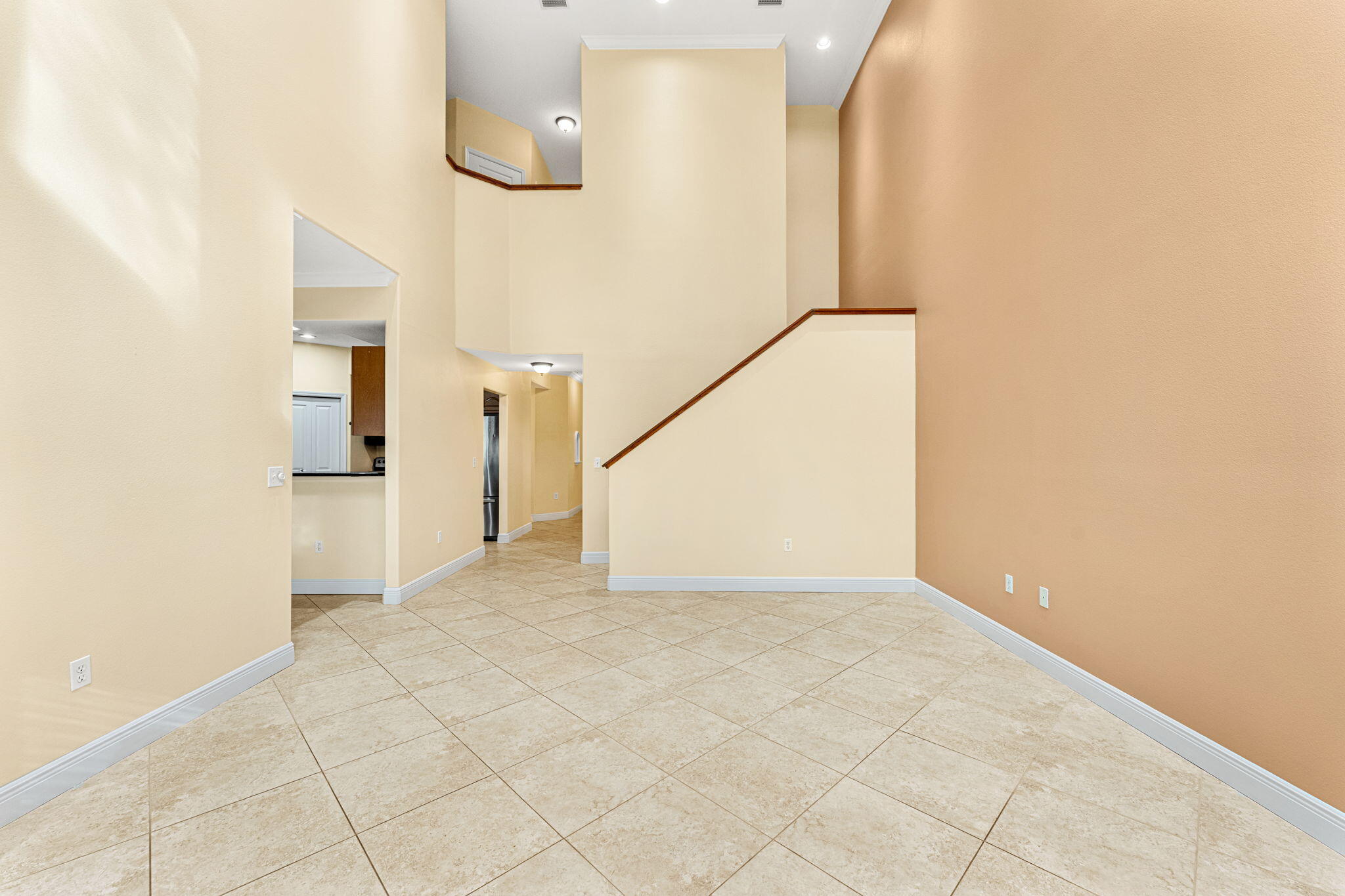 204 Holman Road, Unit 3 Cape Canaveral, FL 32920 - Photo 55 of 61 a view of a hallway with a white walls