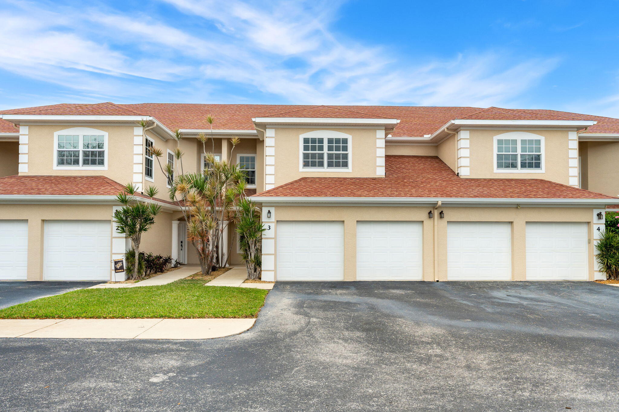 204 Holman Road, Unit 3 Cape Canaveral, FL 32920 - Photo 58 of 61 a front view of house with yard