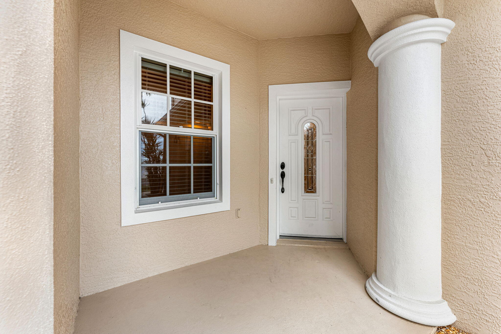 204 Holman Road, Unit 3 Cape Canaveral, FL 32920 - Photo 7 of 61 a view of an empty room with a window