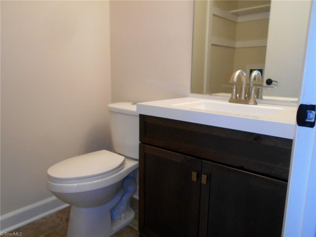 1007 Robinhood Road High Point, NC 27262 - Photo 7 of 11 Half bath on main level