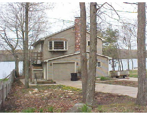 a view of a street in front of a house