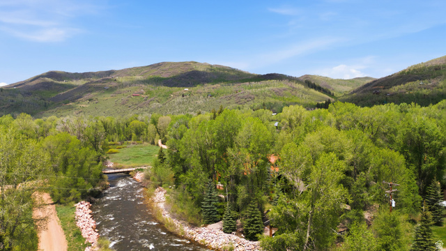 6 Beaver Springs Rancheros Oakley, UT 84055 - Photo 63 of 68 Riverfront property surrounded by lush green trees and natural landscaping