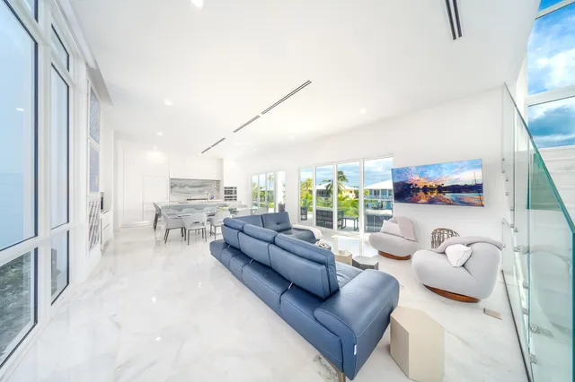 a dining table with chairs and window