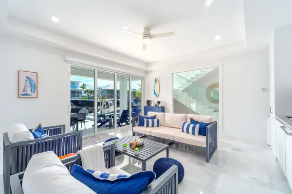 an aerial view of a house with a lake view