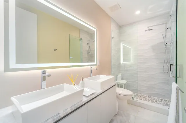 a view of swimming pool with a lounge chairs