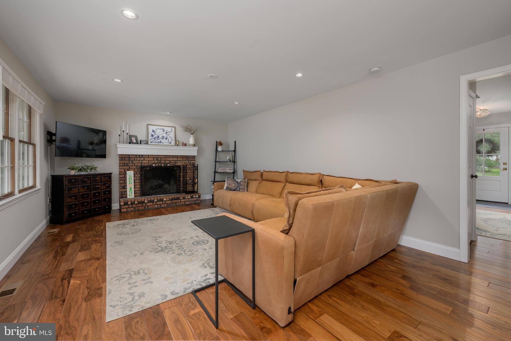 47 Millstone Drive Shamong, NJ 08088 - Photo 13 of 32 a living room with furniture and a fireplace